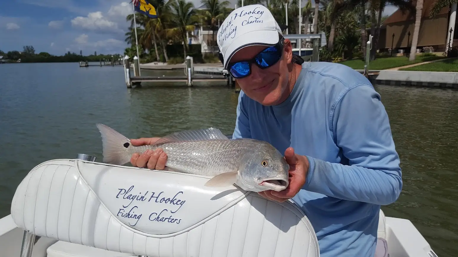 Playin' Hookey Fishing Charters: Captain Pete with a redfish, Venice, FL